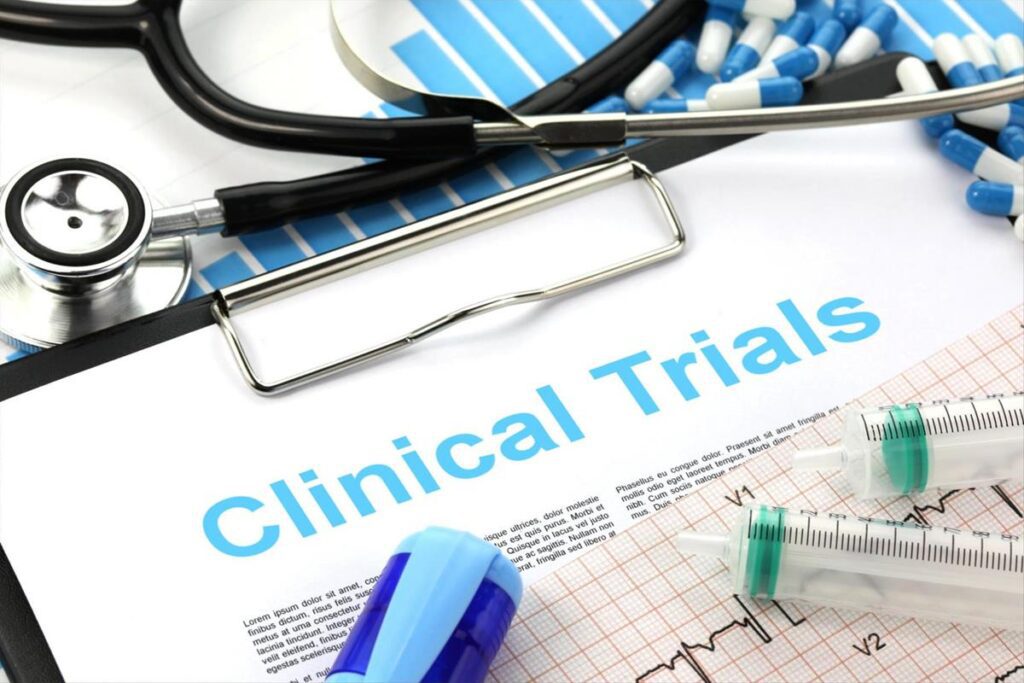 Clinical trials document with medical equipment.